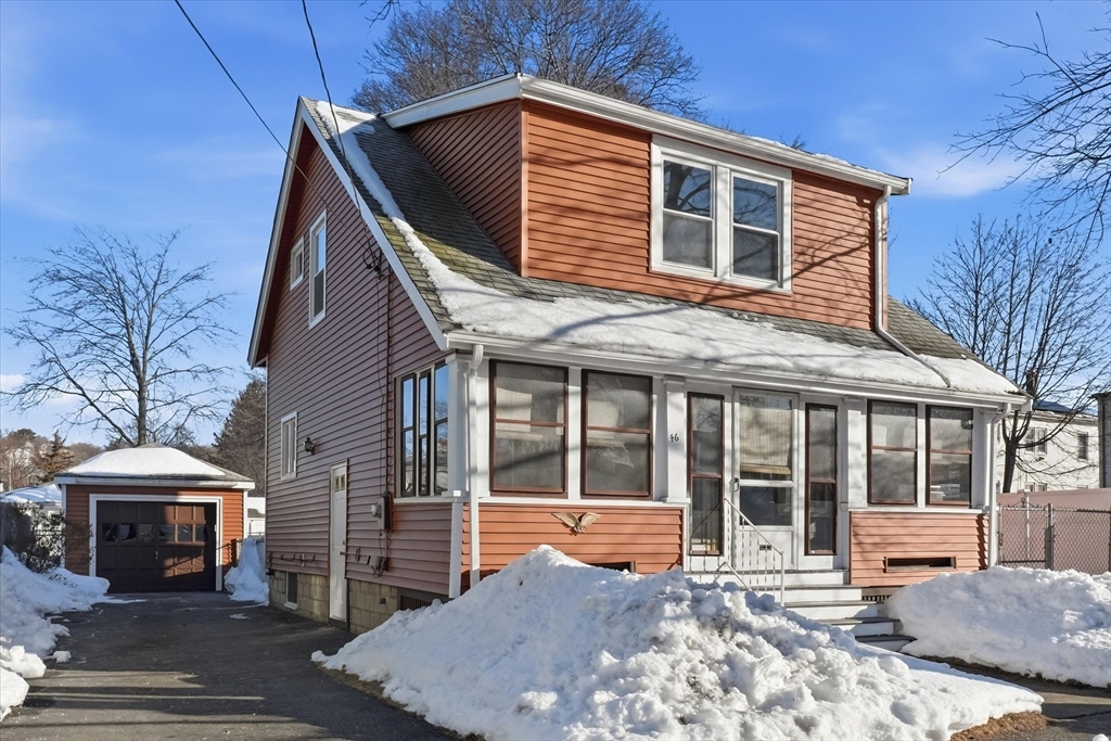 46 Wilfred Street Lynn, MA 01905 - Photo 1 of 29 a front view of a house with a yard