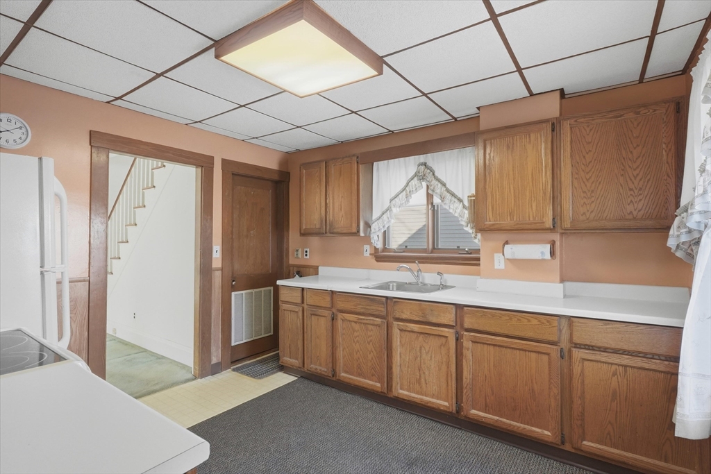 46 Wilfred Street Lynn, MA 01905 - Photo 11 of 29 a bathroom with a sink and mirror