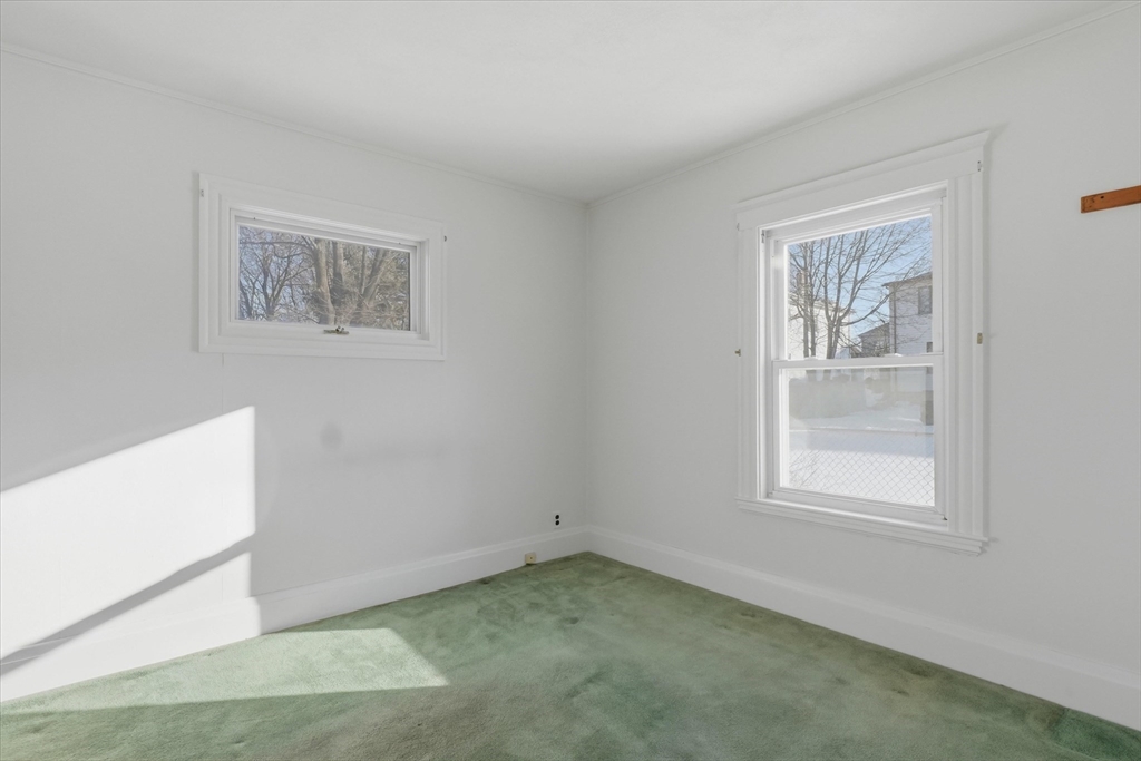 46 Wilfred Street Lynn, MA 01905 - Photo 14 of 29 an empty room with a window