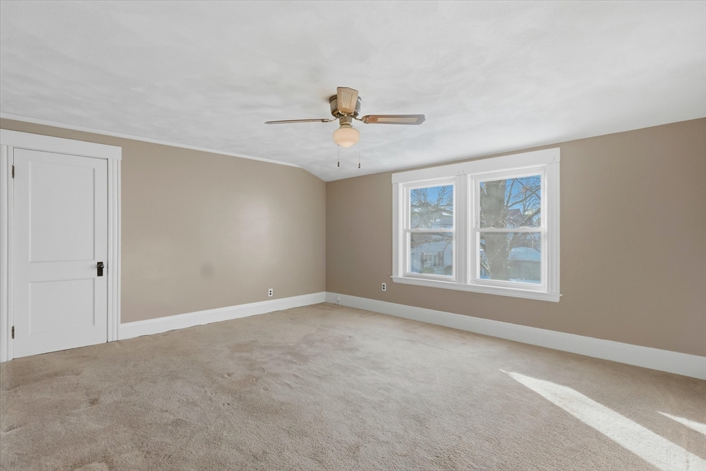 46 Wilfred Street Lynn, MA 01905 - Photo 18 of 29 a view of an empty room with a window