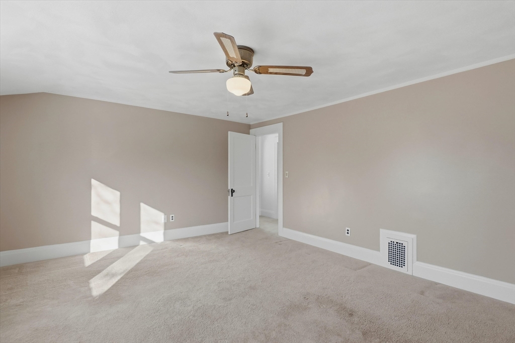 46 Wilfred Street Lynn, MA 01905 - Photo 19 of 29 a view of an empty room with a window