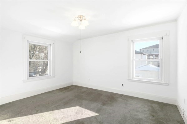 46 Wilfred Street Lynn, MA 01905 - Photo 20 of 29 an empty room with windows