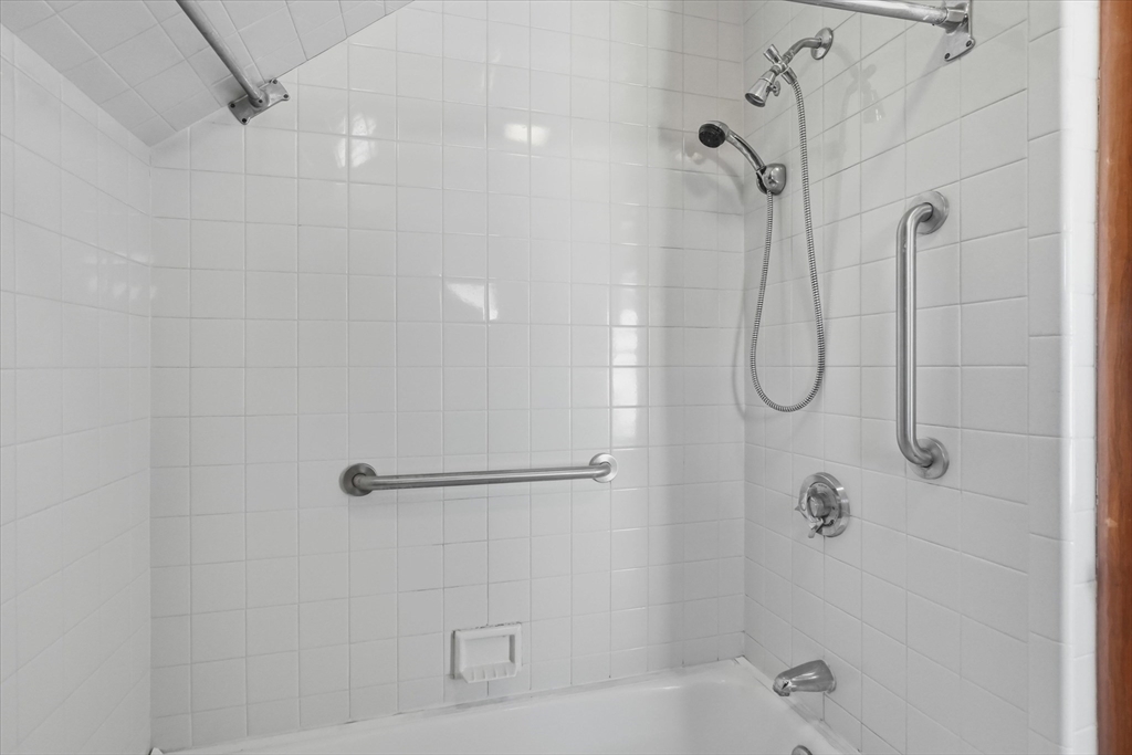 46 Wilfred Street Lynn, MA 01905 - Photo 24 of 29 a bathroom with a shower and a shower