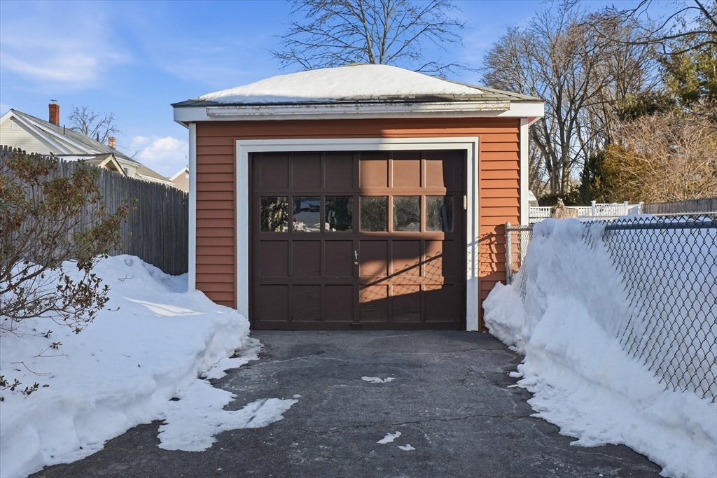 46 Wilfred Street Lynn, MA 01905 - Photo 6 of 29 a front view of a house with a yard