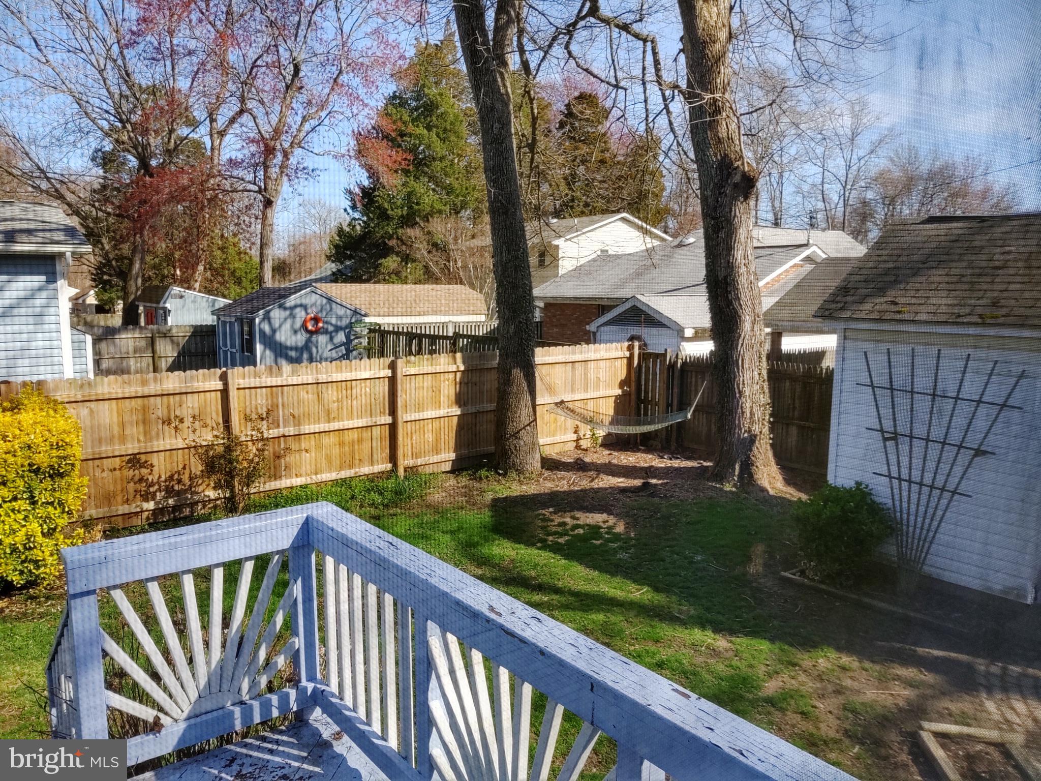 609 Mann Road Deale, MD 20751 - Photo 11 of 24 a view of a house with backyard and sitting area