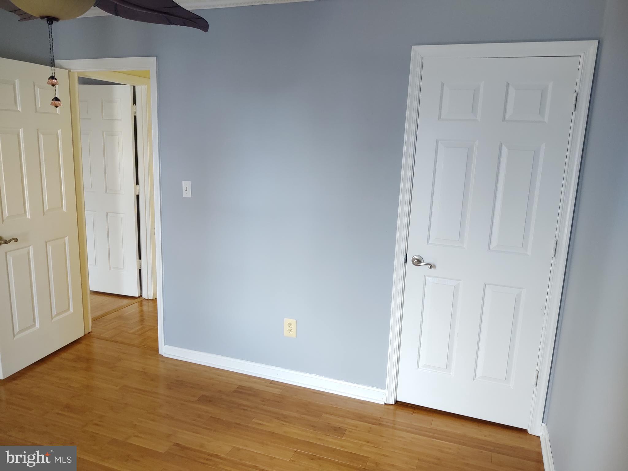 609 Mann Road Deale, MD 20751 - Photo 20 of 24 a view of an empty room with wooden floor