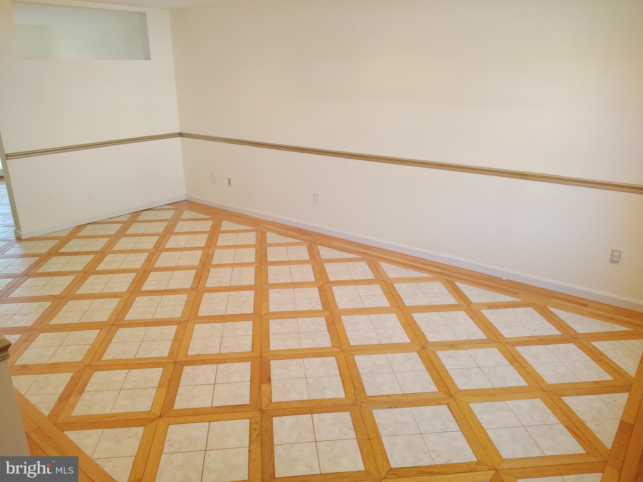 609 Mann Road Deale, MD 20751 - Photo 6 of 24 a view of empty room with windows