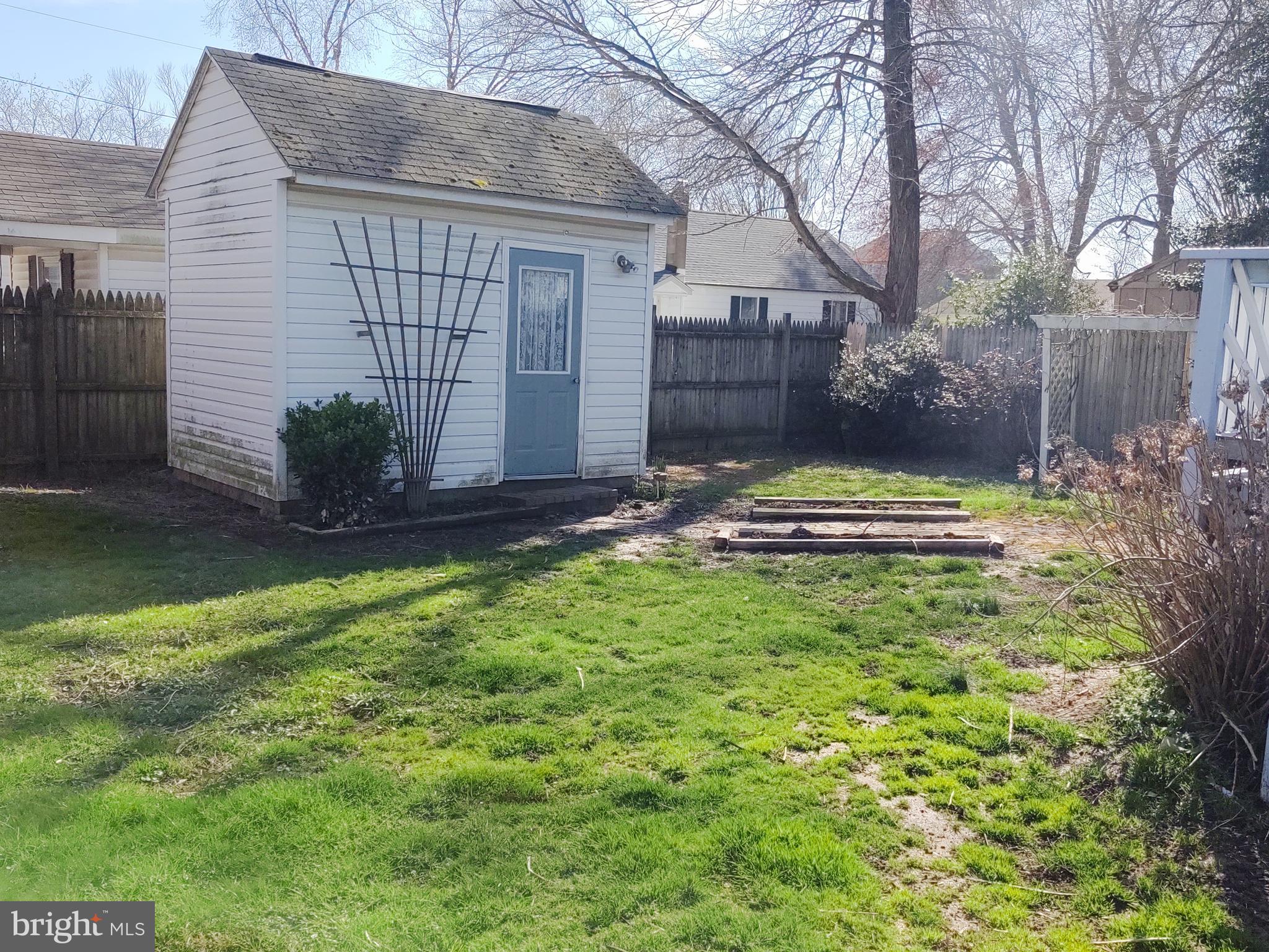 609 Mann Road Deale, MD 20751 - Photo 7 of 24 a backyard of a house with lots of green space