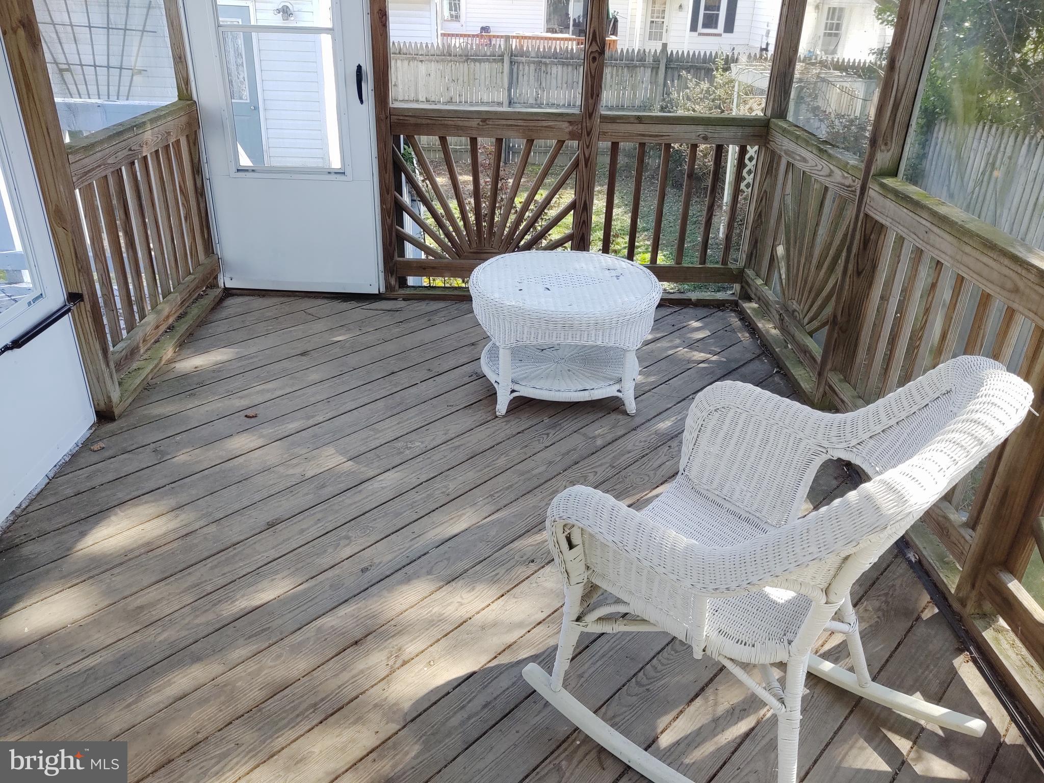 609 Mann Road Deale, MD 20751 - Photo 9 of 24 a view of balcony with wooden floor
