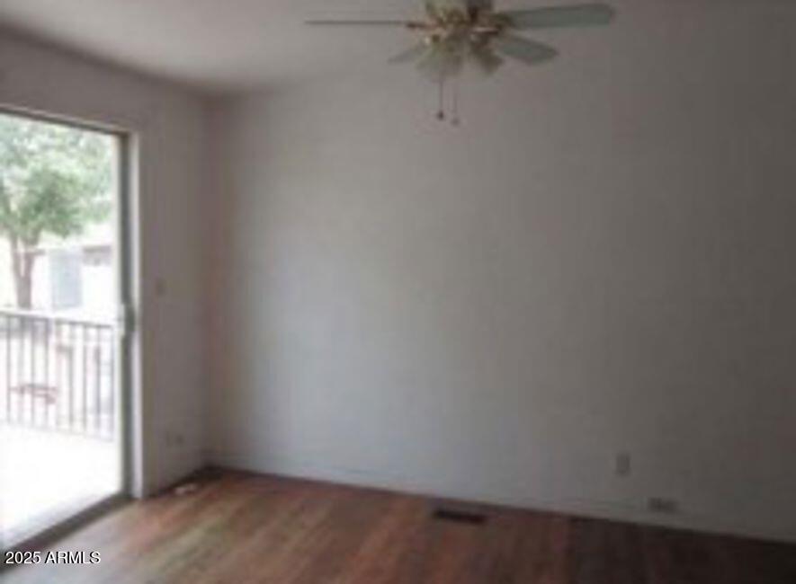1495 Buffalo Run Road Chino Valley, AZ 86323 - Photo 11 of 20 a view of an empty room with a window