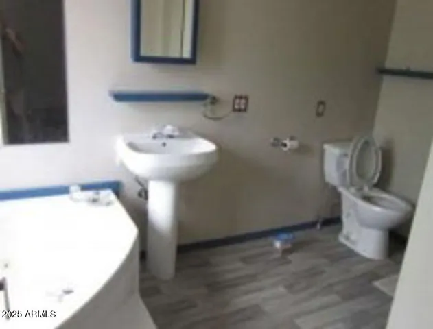 a bathroom with a sink and vanity