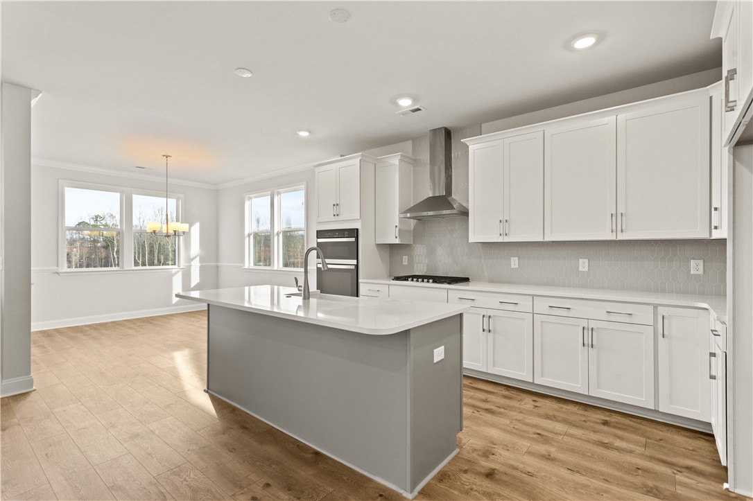 134 Anderson Oaks Lane, Unit 84 Easley, SC 29642 - Photo 14 of 43 This bright kitchen features sleek appliances and ample counter space, perfect for culinary endeavors.