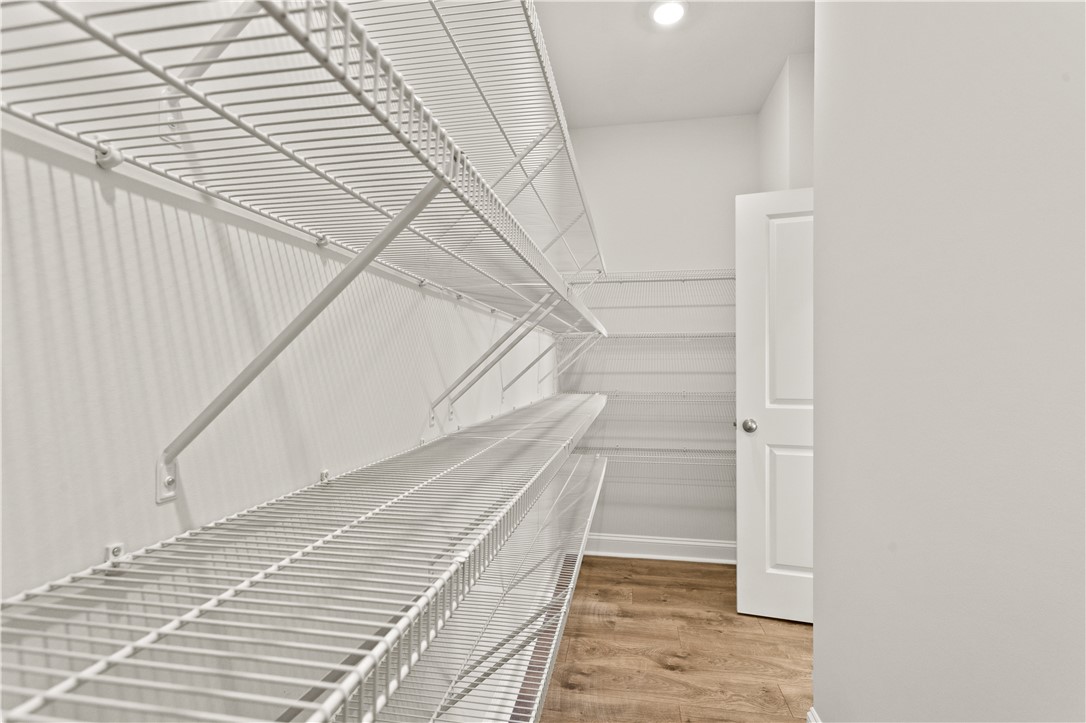 134 Anderson Oaks Lane, Unit 84 Easley, SC 29642 - Photo 16 of 43 This spacious closet offers ample storage with wire shelving and durable hardwood flooring.