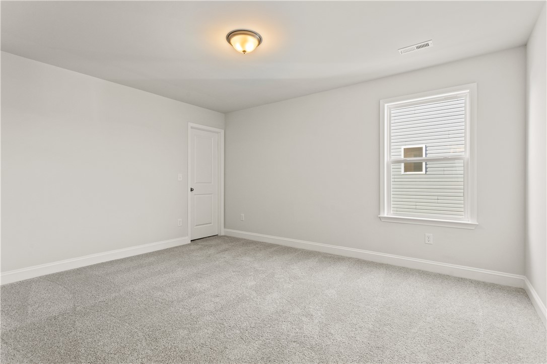 134 Anderson Oaks Lane, Unit 84 Easley, SC 29642 - Photo 29 of 43 This spacious room provides a blank canvas, perfect for creating your ideal living area.