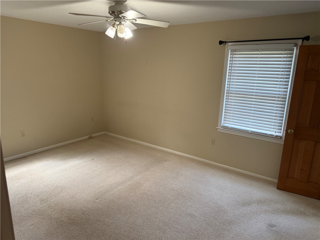 121 Nautical Way Anderson, SC 29625 - Photo 28 of 37 A comfortable bedroom with soft carpeting and a ceiling fan awaits your personal touch.