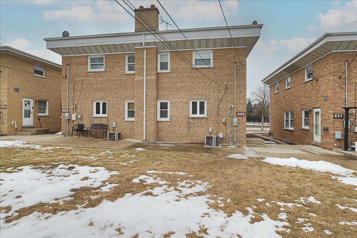 449 Elmhurst Road Mount Prospect, IL 60056 - Photo 25 of 26 a view of a house with a yard