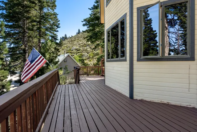 a view of balcony and wooden floor