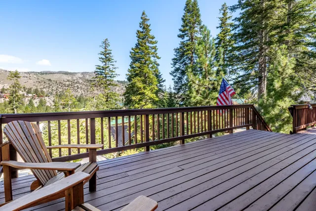a view of wooden balcony with a swing