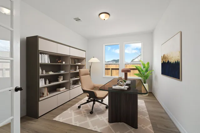 a room with furniture and wooden floor