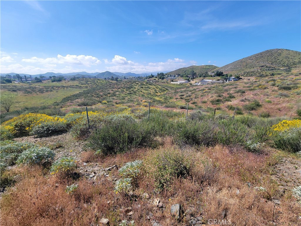 0 Surfiside Menifee, CA 92587 - Photo 12 of 14 a view of a lake with mountains in the background