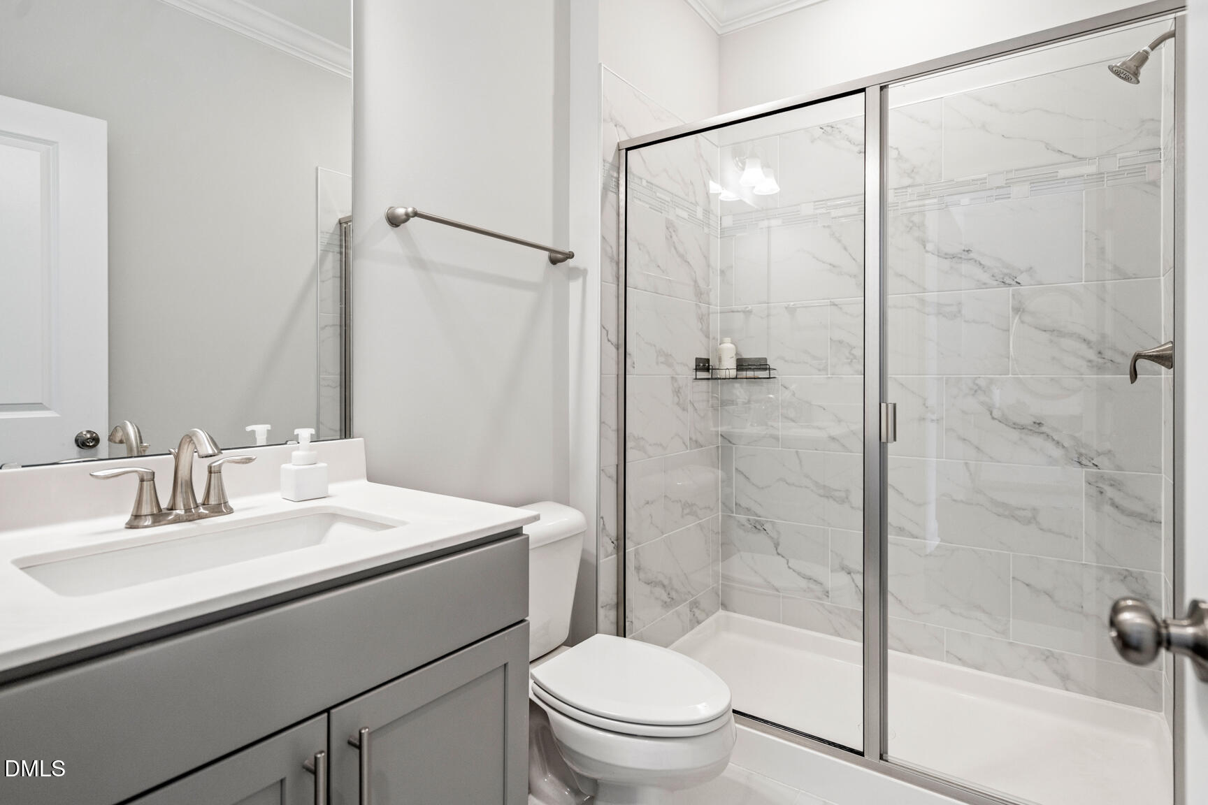 2966 Rise And Shine Road Apex, NC 27502 - Photo 14 of 61 a bathroom with a sink toilet and shower