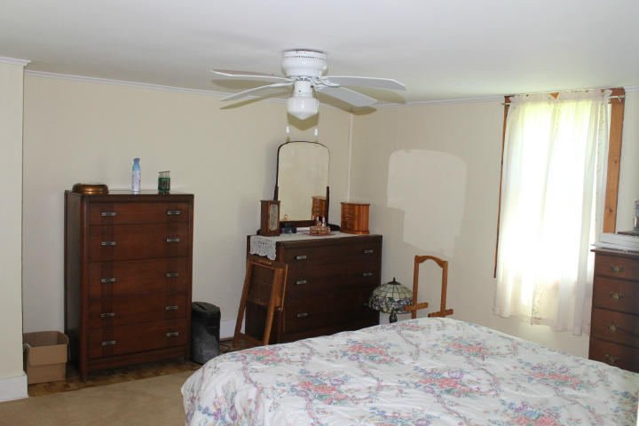 2840 Hancock Road Hancock, MA 01267 - Photo 8 of 9 a bedroom with a bed and a dresser