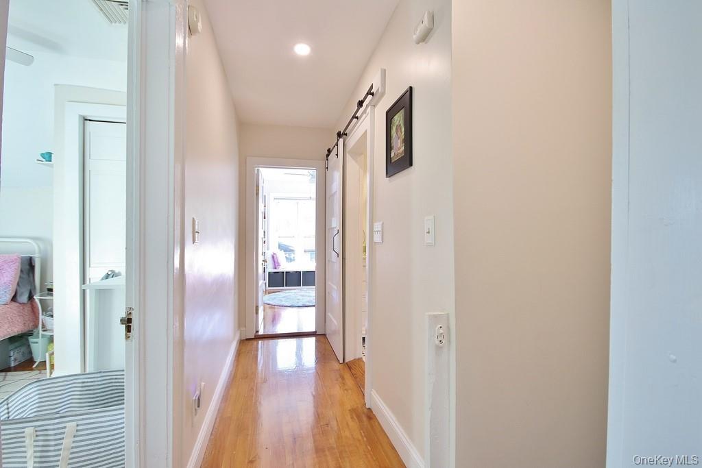 22 High Street Garnerville, NY 10923 - Photo 20 of 49 a view of hallway with wooden floor