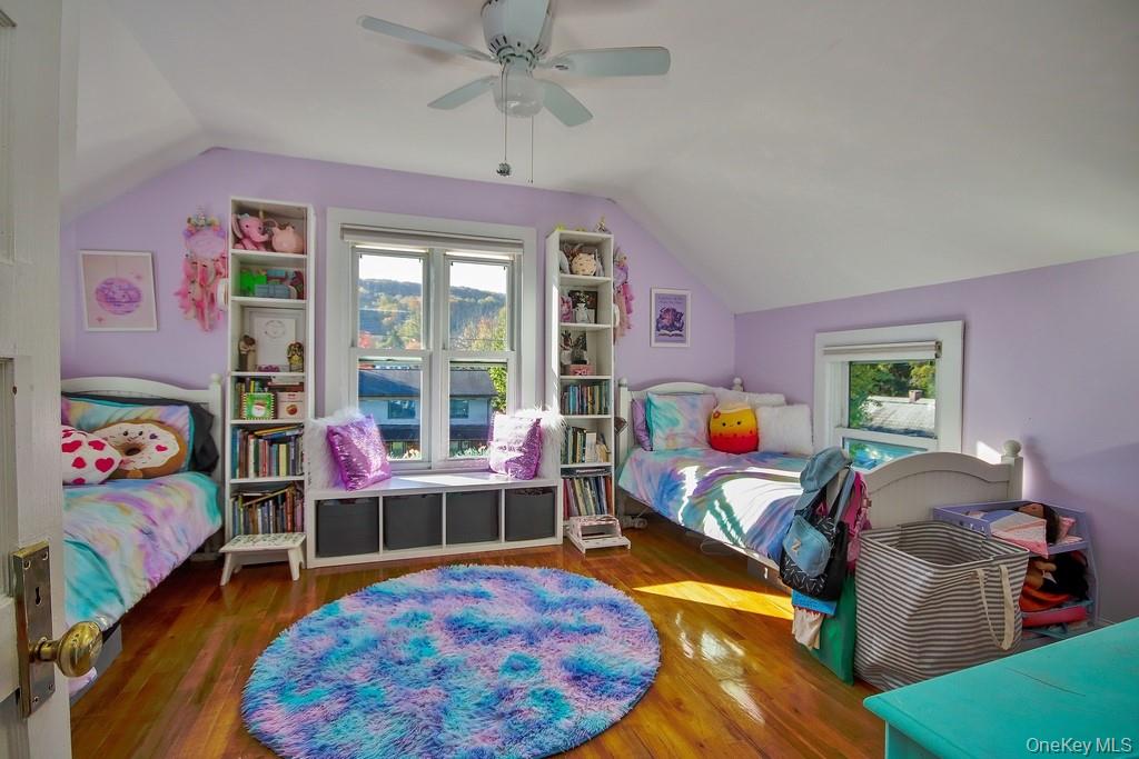 22 High Street Garnerville, NY 10923 - Photo 24 of 49 a bed room with furniture and a wooden floor
