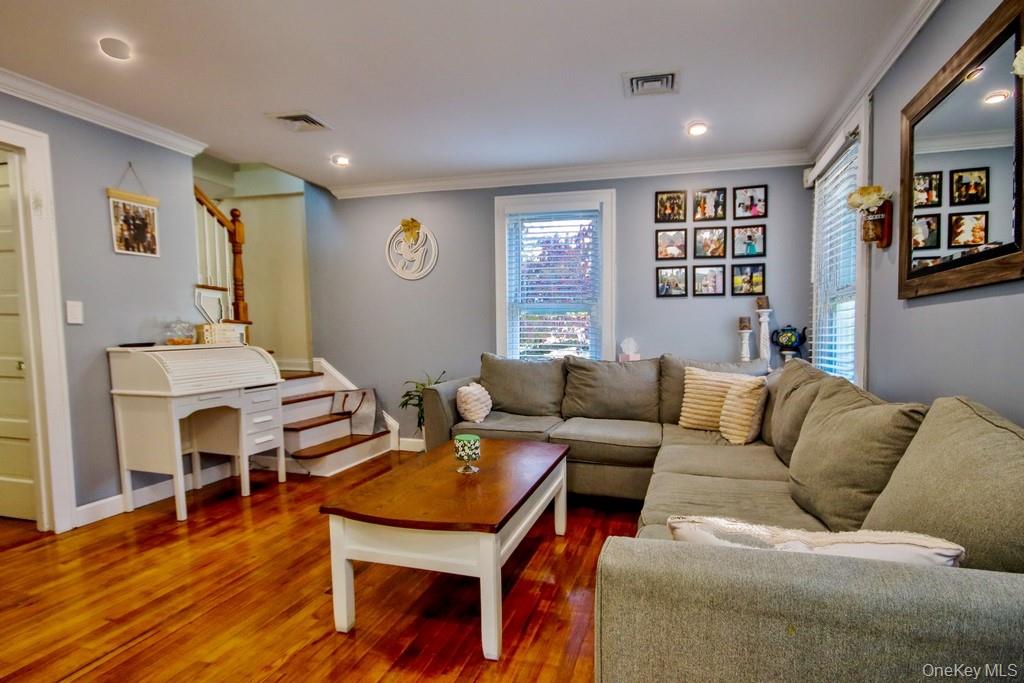 22 High Street Garnerville, NY 10923 - Photo 7 of 49 a living room with furniture and a wooden floor