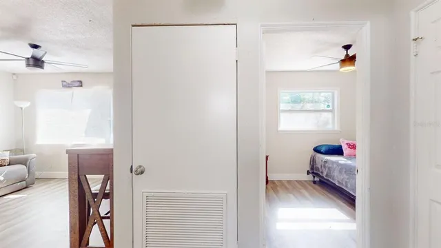 a view of a bathroom from a hallway