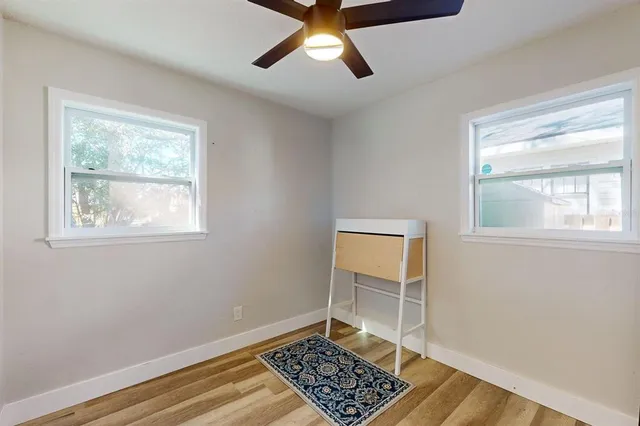 a view of room with window and closet