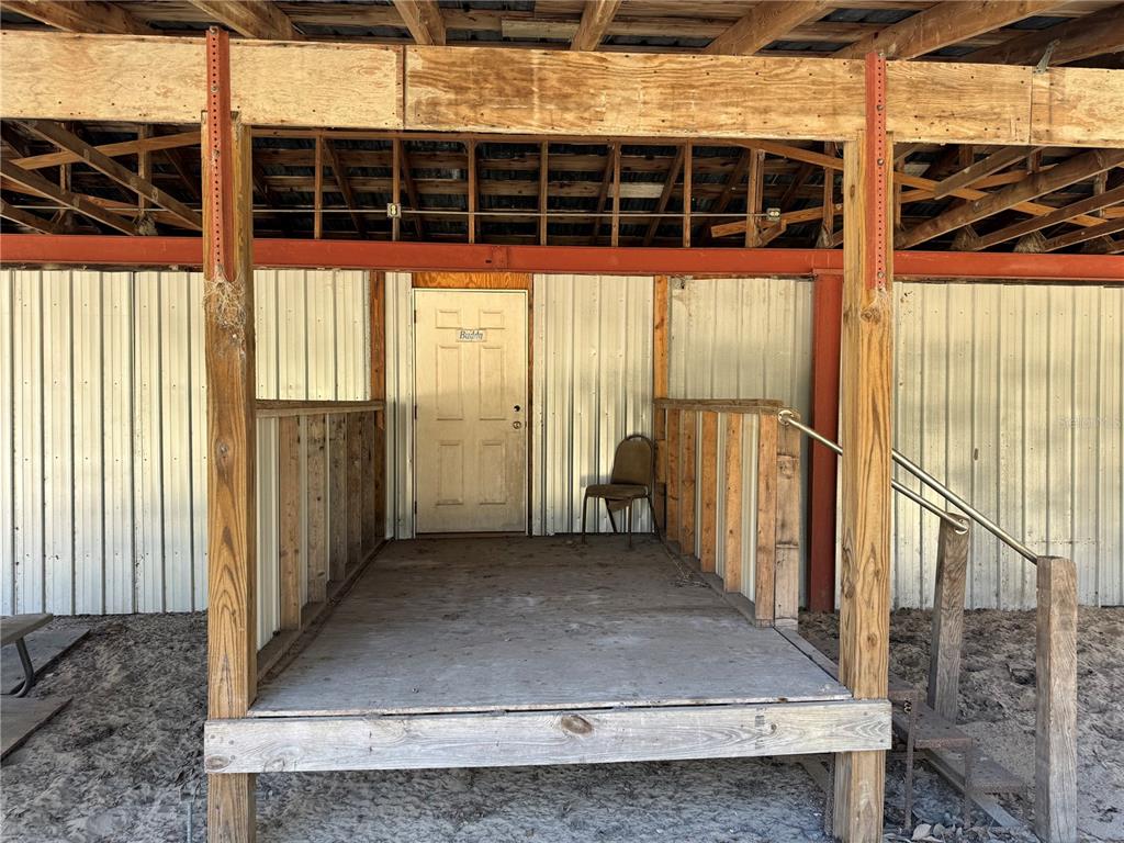 18630 Bradshaw Road Dade City, FL 33523 - Photo 8 of 43 a view of a porch with a floor to ceiling window