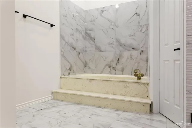 a bathroom with a bathtub