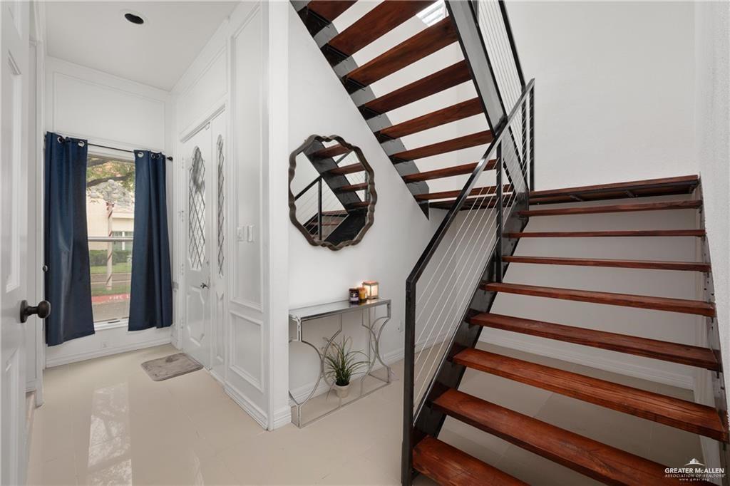 3100 South 2nd Street, Unit 29 McAllen, TX 78503 - Photo 2 of 23 a view of entryway and hall with wooden floor