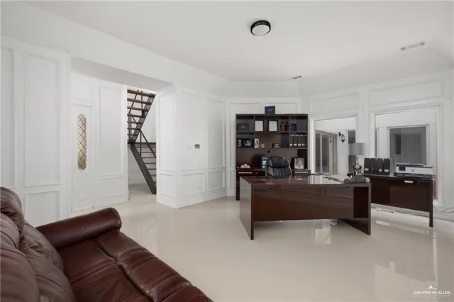 a living room with furniture and a couch