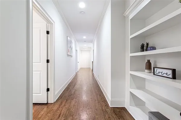 a view of a hallway with closet