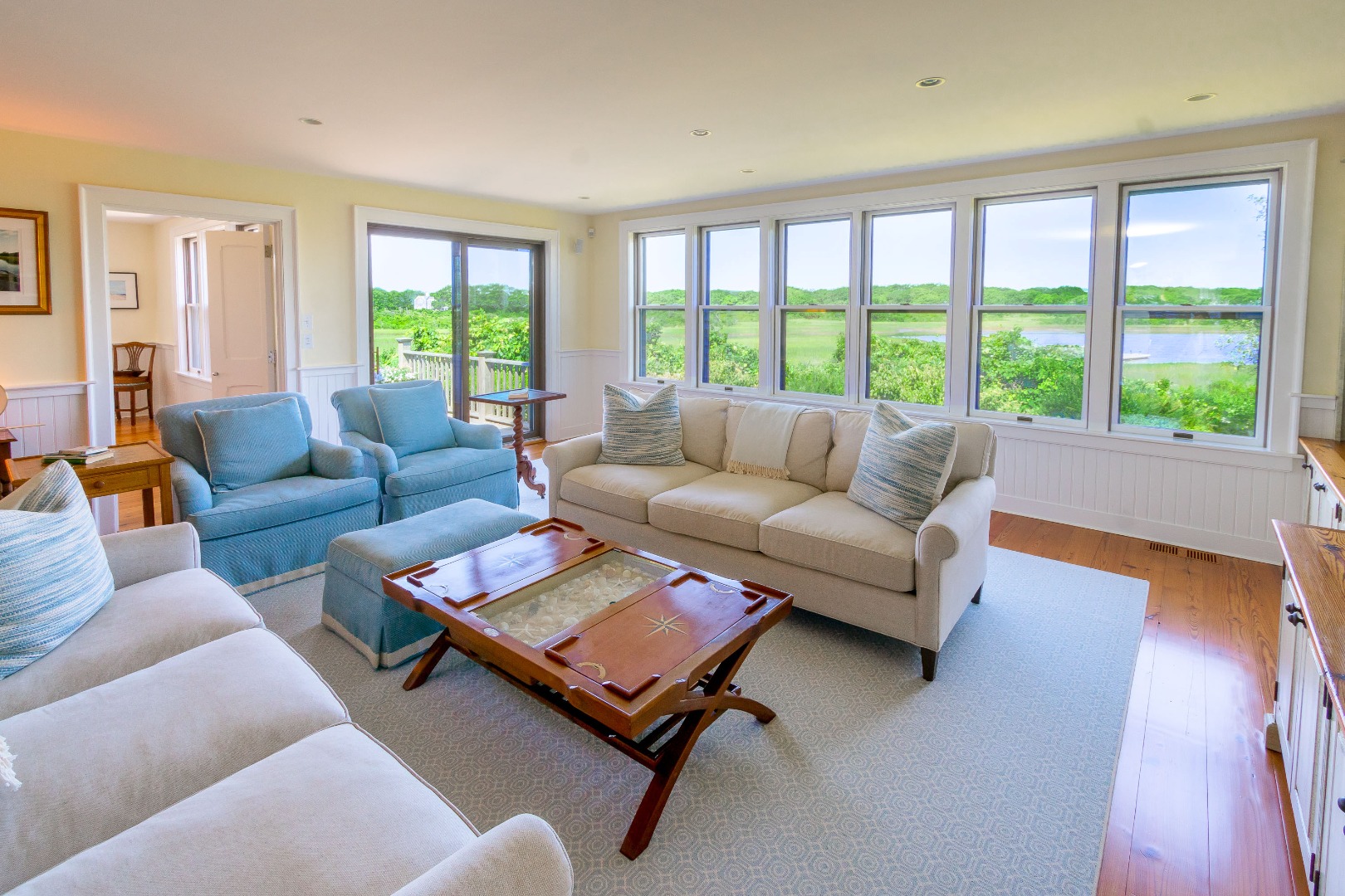 240 Polpis Road Nantucket, MA 02554 - Photo 12 of 45 a living room with furniture and a large window