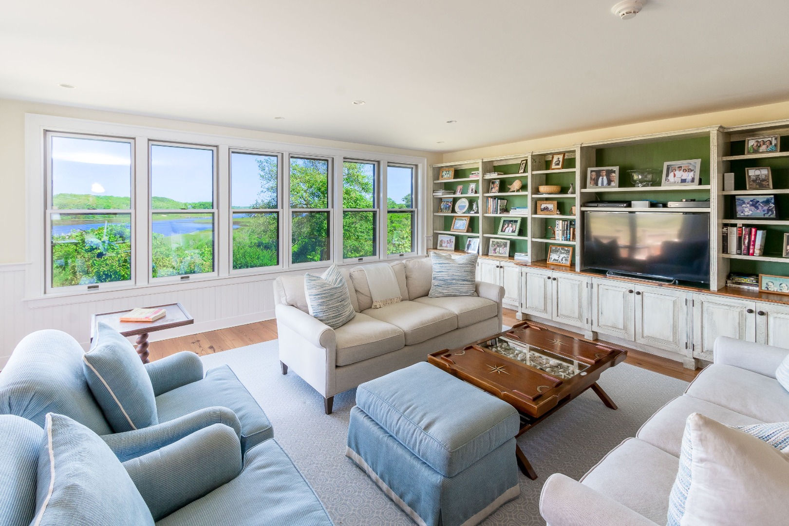 240 Polpis Road Nantucket, MA 02554 - Photo 13 of 45 a living room with furniture and a flat screen tv