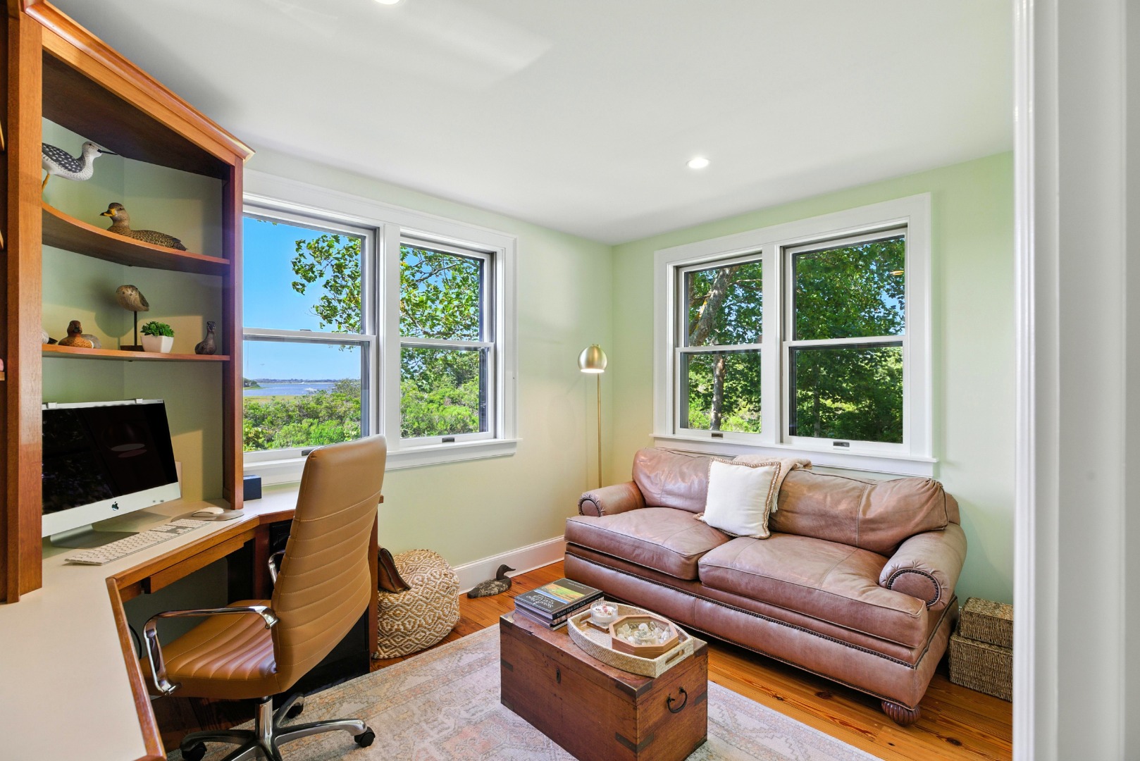 240 Polpis Road Nantucket, MA 02554 - Photo 14 of 45 a living room with furniture a flat screen tv and a window