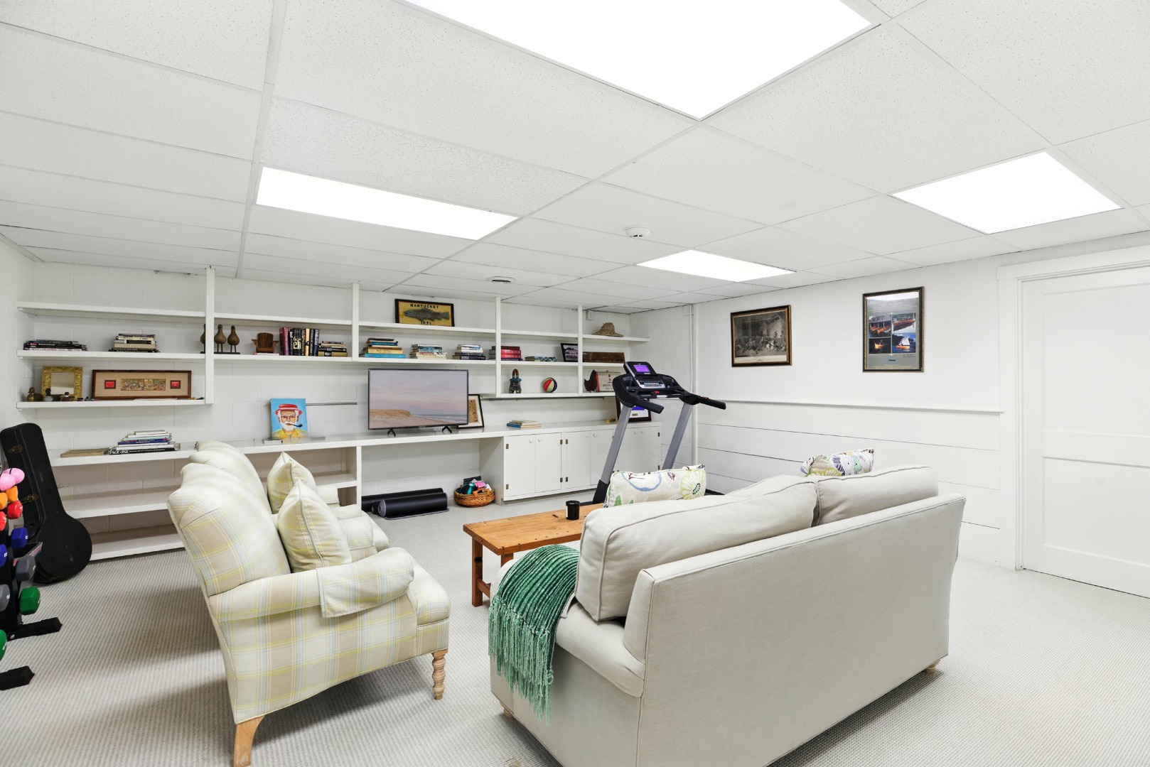 240 Polpis Road Nantucket, MA 02554 - Photo 29 of 45 a living room with furniture and a flat screen tv