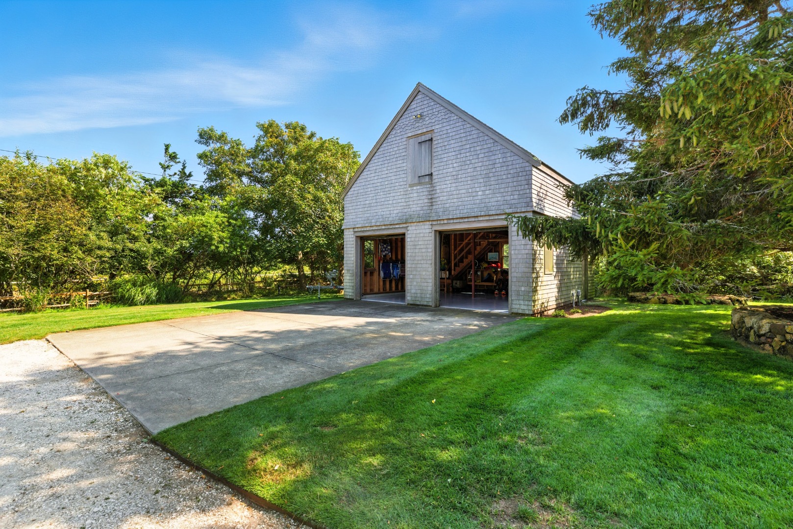 240 Polpis Road Nantucket, MA 02554 - Photo 32 of 45 a view of a house with a yard