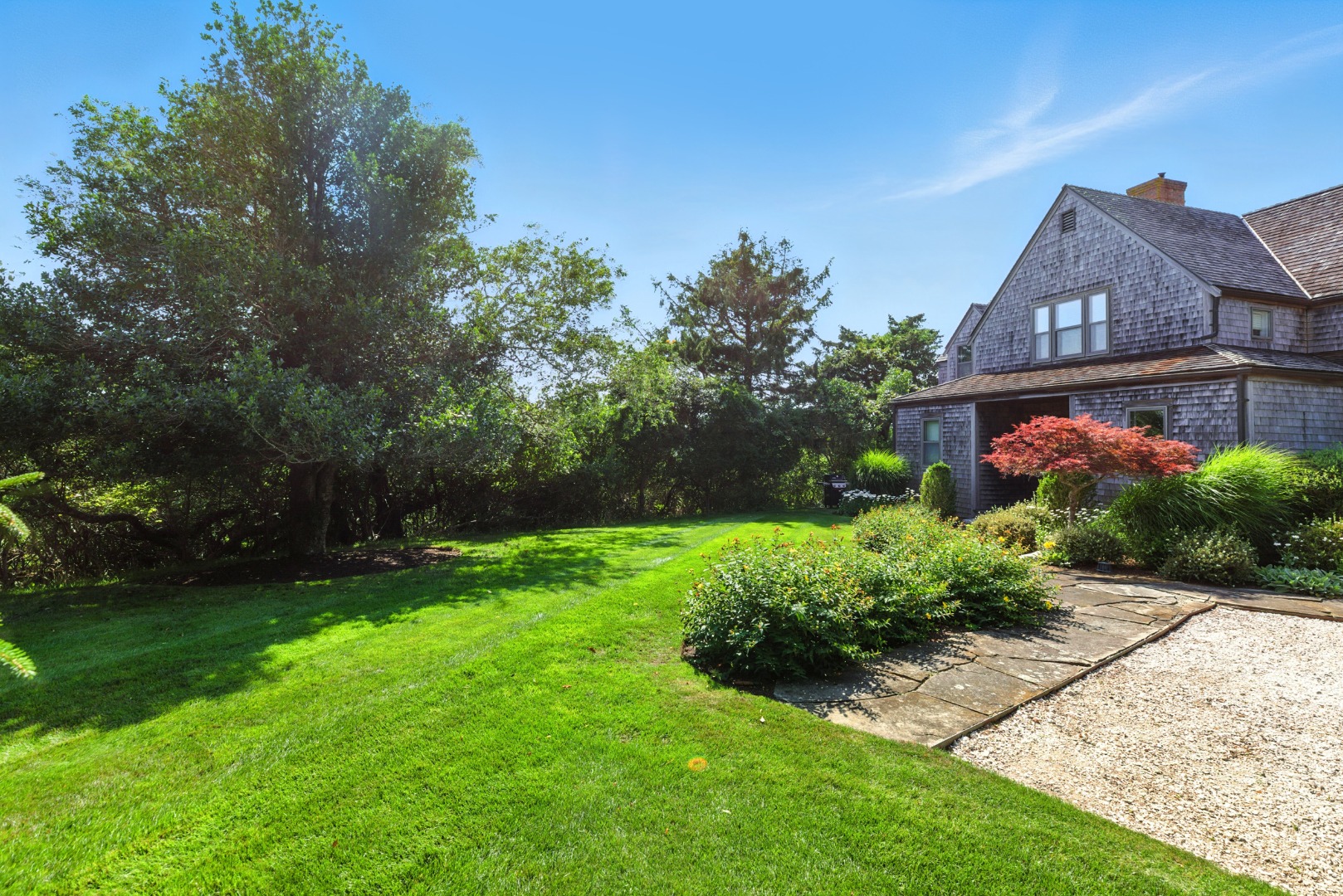 240 Polpis Road Nantucket, MA 02554 - Photo 39 of 45 a front view of house with a garden