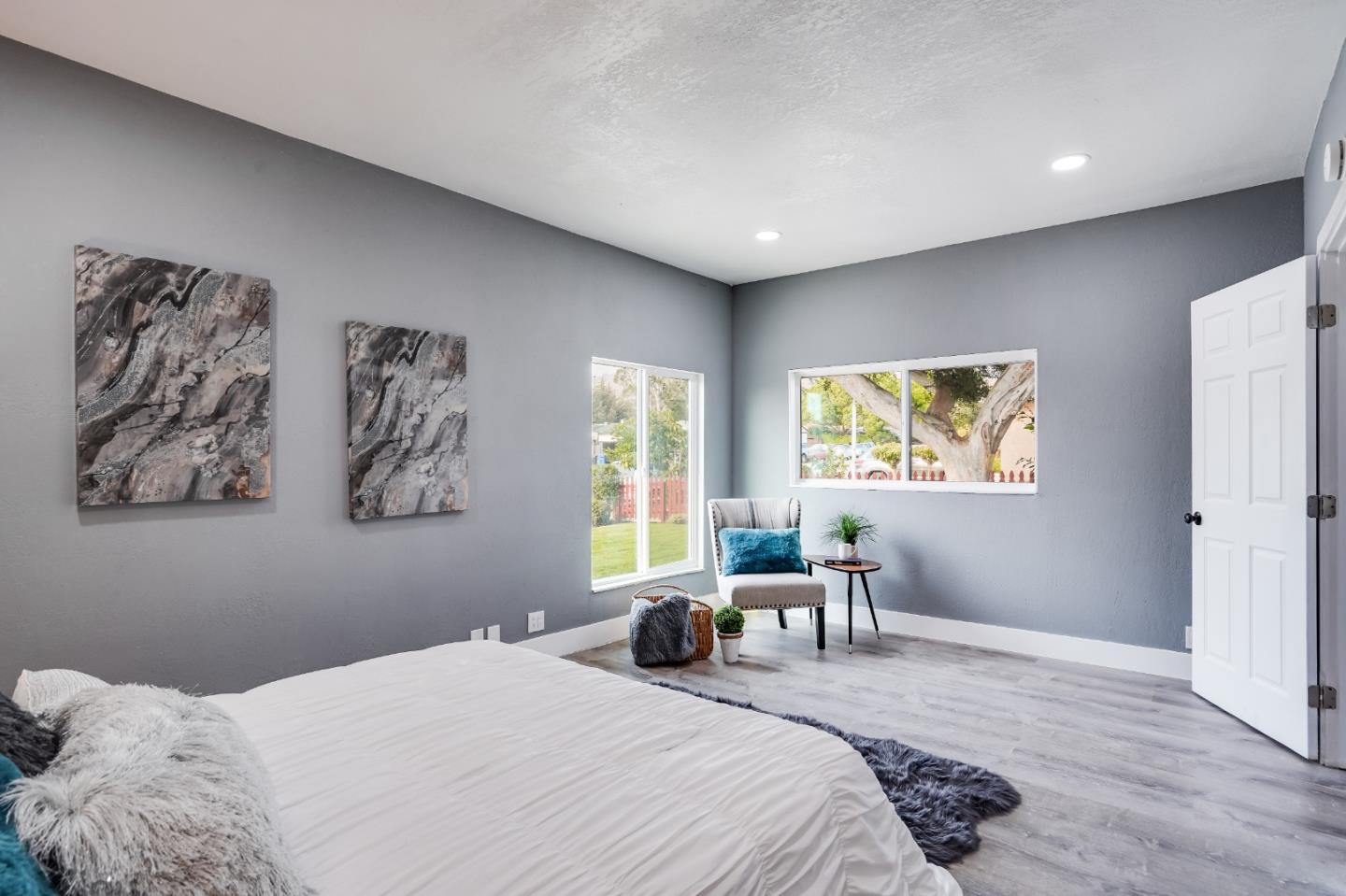 460 Dixon Road Milpitas, CA 95035 - Photo 15 of 36 a bedroom with a bed and a large window