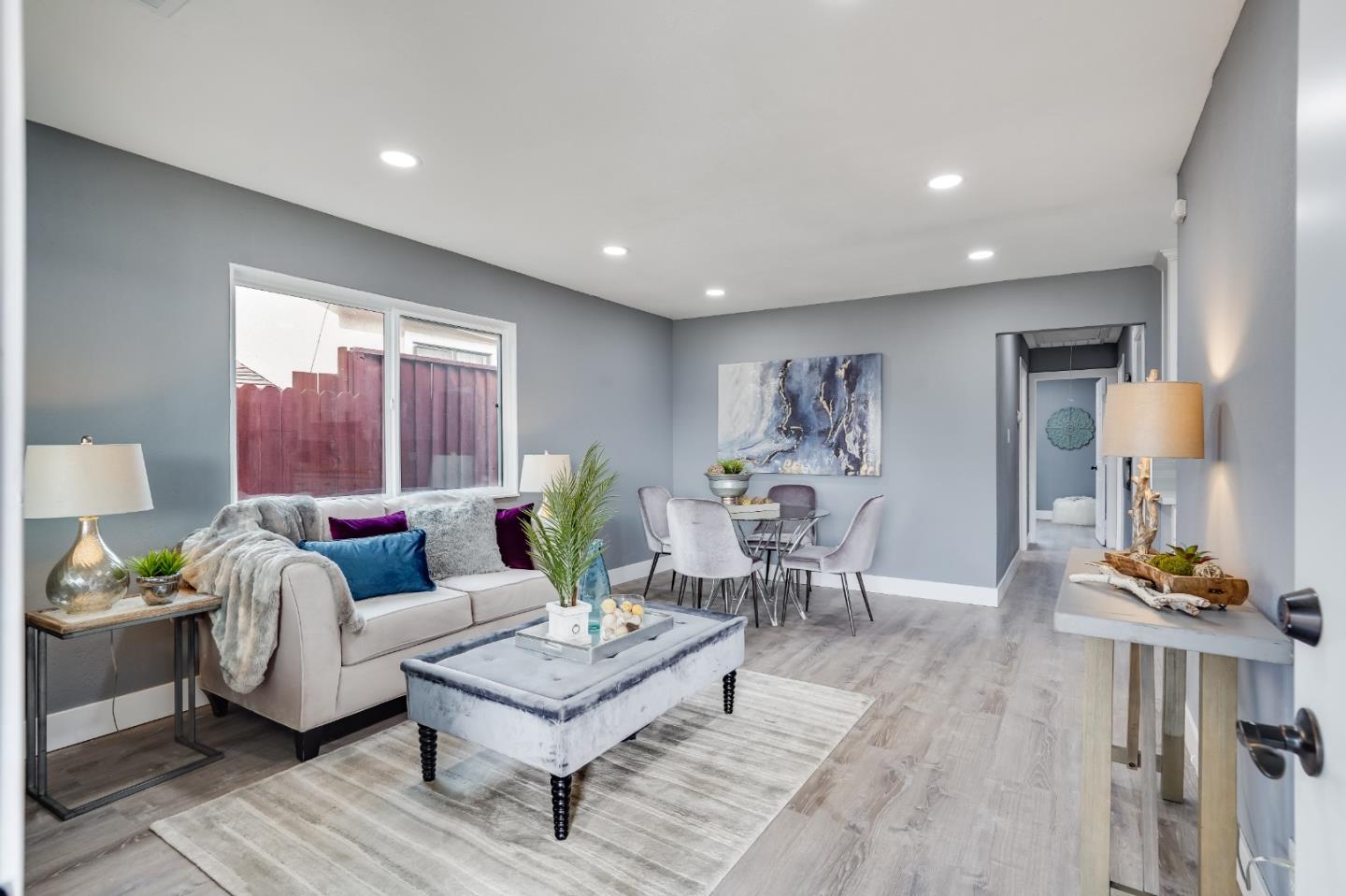 460 Dixon Road Milpitas, CA 95035 - Photo 4 of 36 a living room with furniture and wooden floor