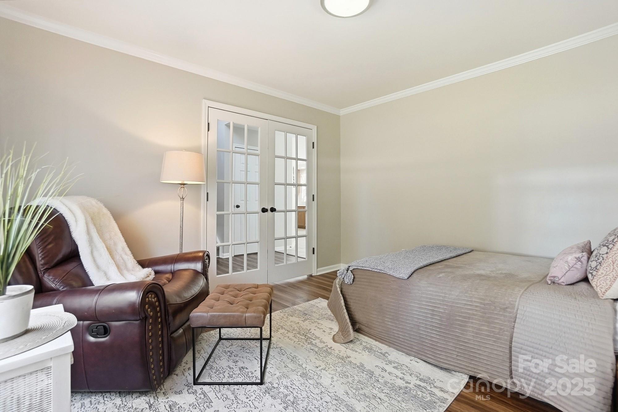 7200 Cascading Pines Drive Tega Cay, SC 29708 - Photo 20 of 39 a room with a chair and gym equipment