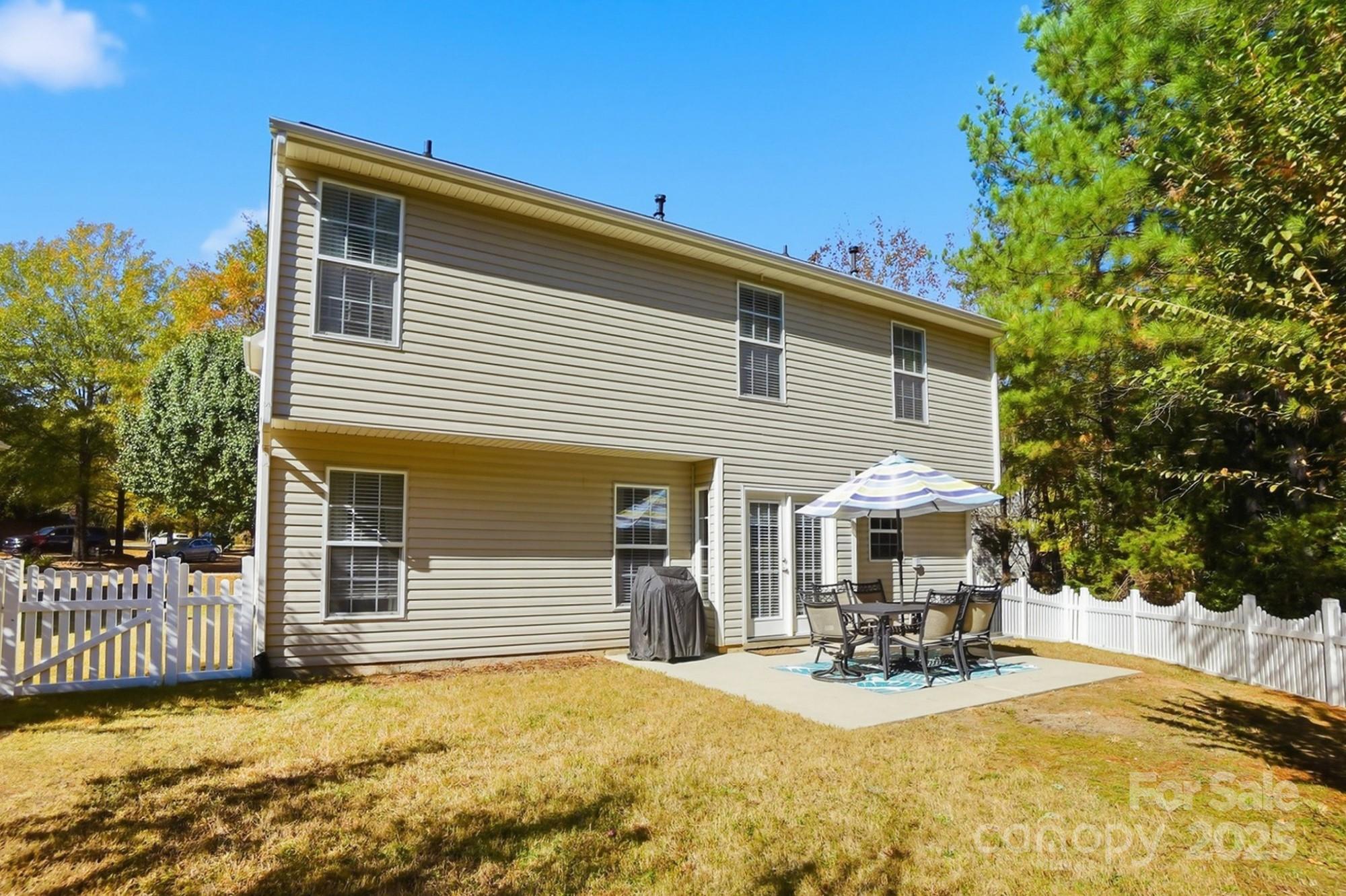 7200 Cascading Pines Drive Tega Cay, SC 29708 - Photo 35 of 39 a view of a house with patio