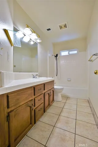a view of a house with a snow on the road