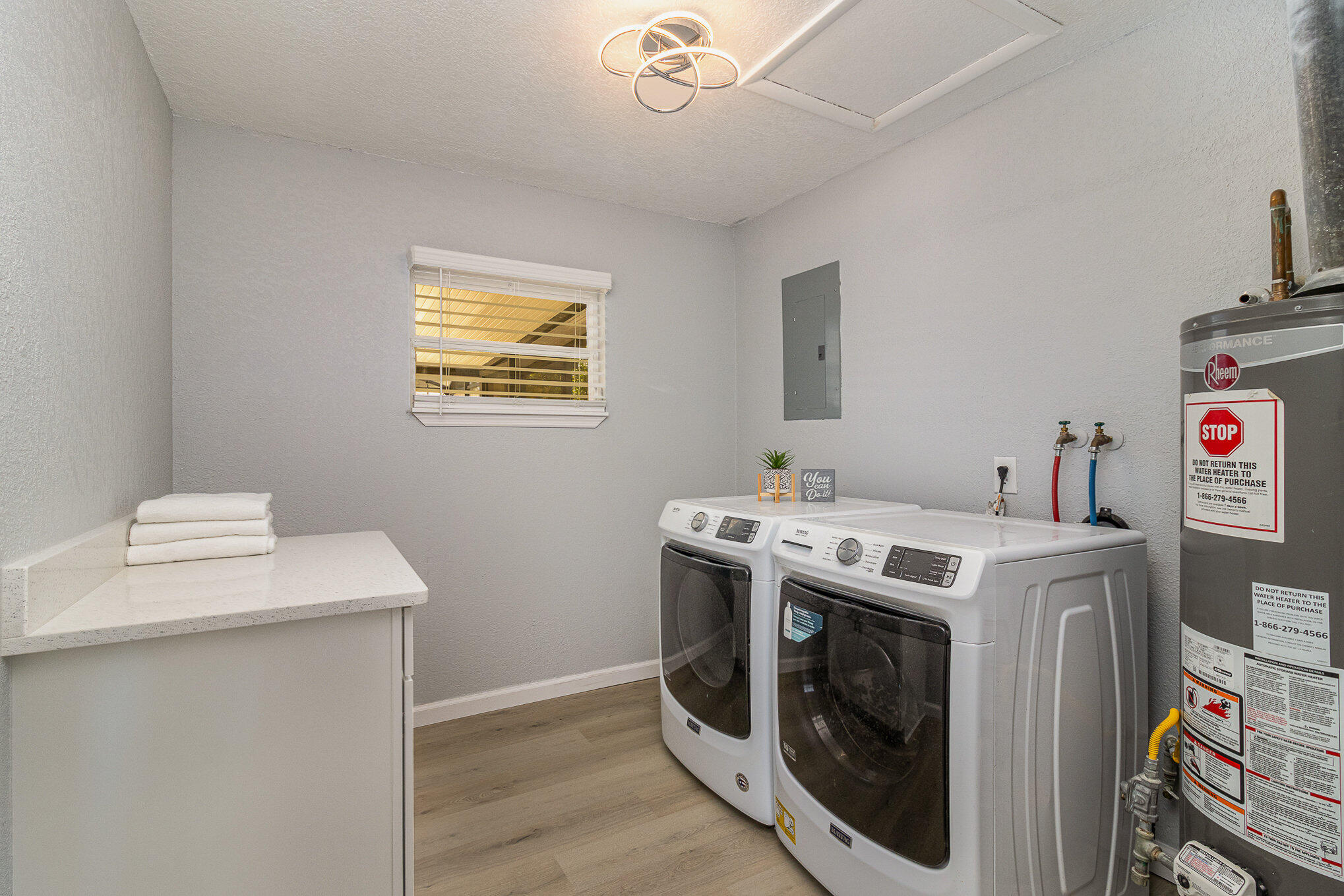 937 Kings Post Road Rockledge, FL 32955 - Photo 21 of 24 a utility room with dryer and washer