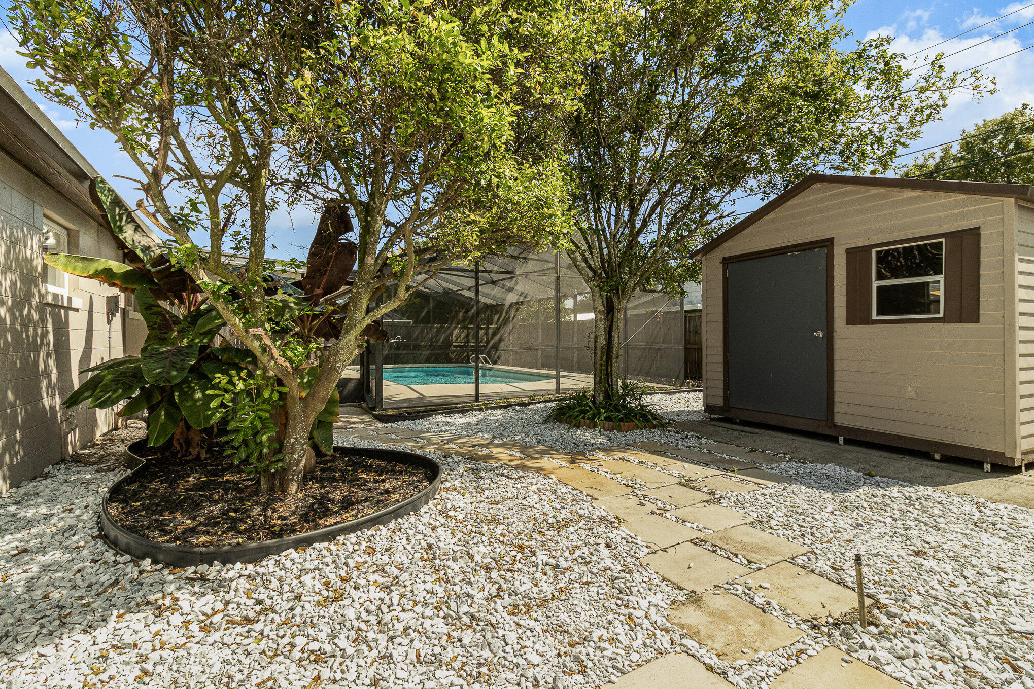 937 Kings Post Road Rockledge, FL 32955 - Photo 23 of 24 a view of a house with a yard