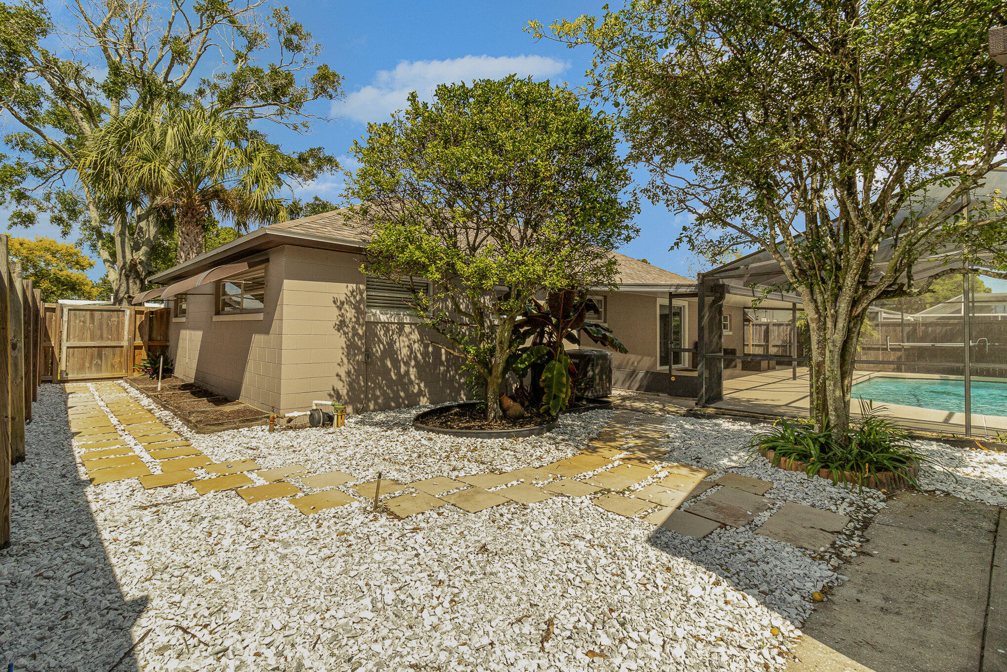937 Kings Post Road Rockledge, FL 32955 - Photo 7 of 24 a view of a house with snow on the road